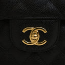 Chanel Jumbo Caviar Classic...