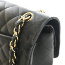 Chanel Jumbo Caviar Classic...