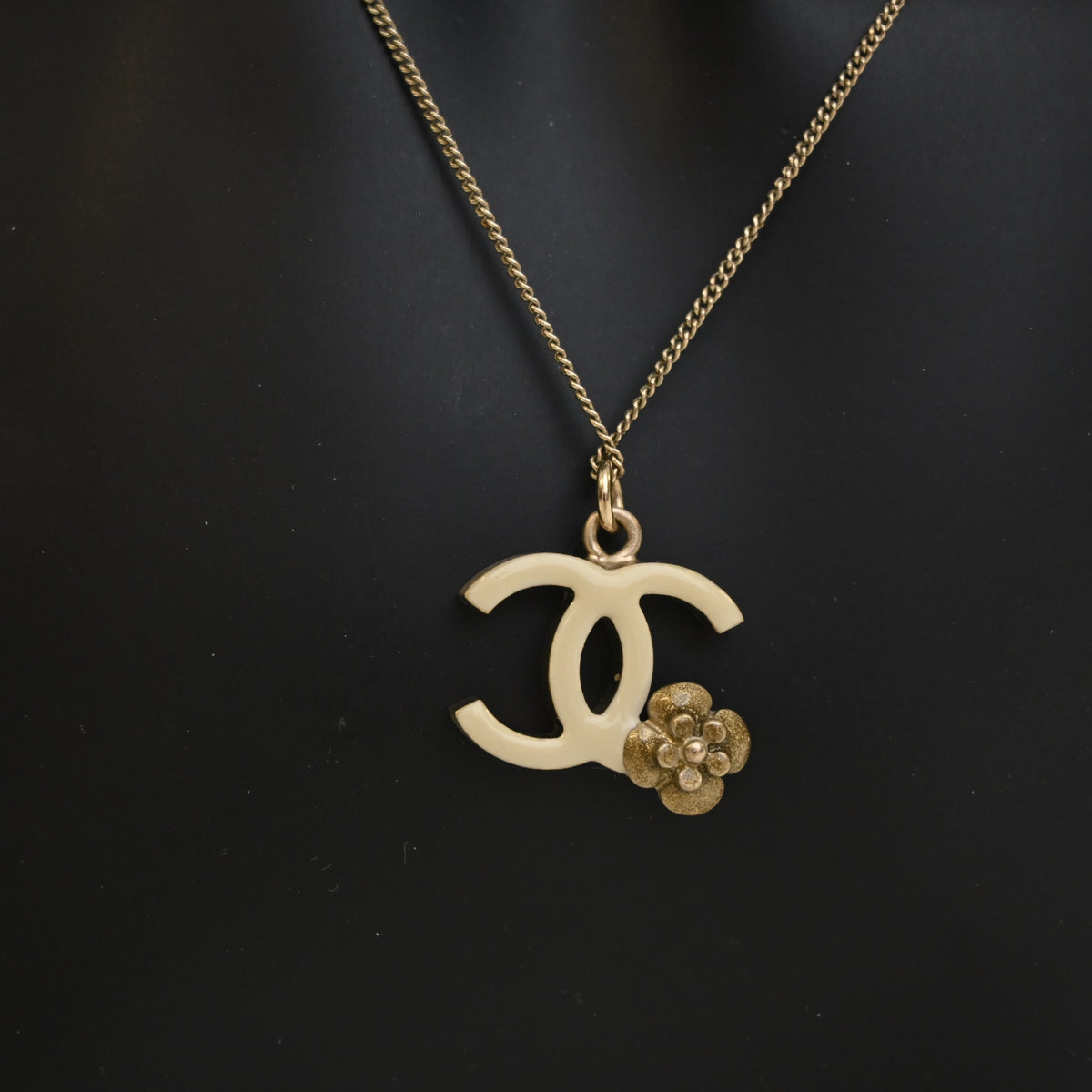 Pre-Owned Chanel Necklace CC Camellia Pendant, gold hardware close-up