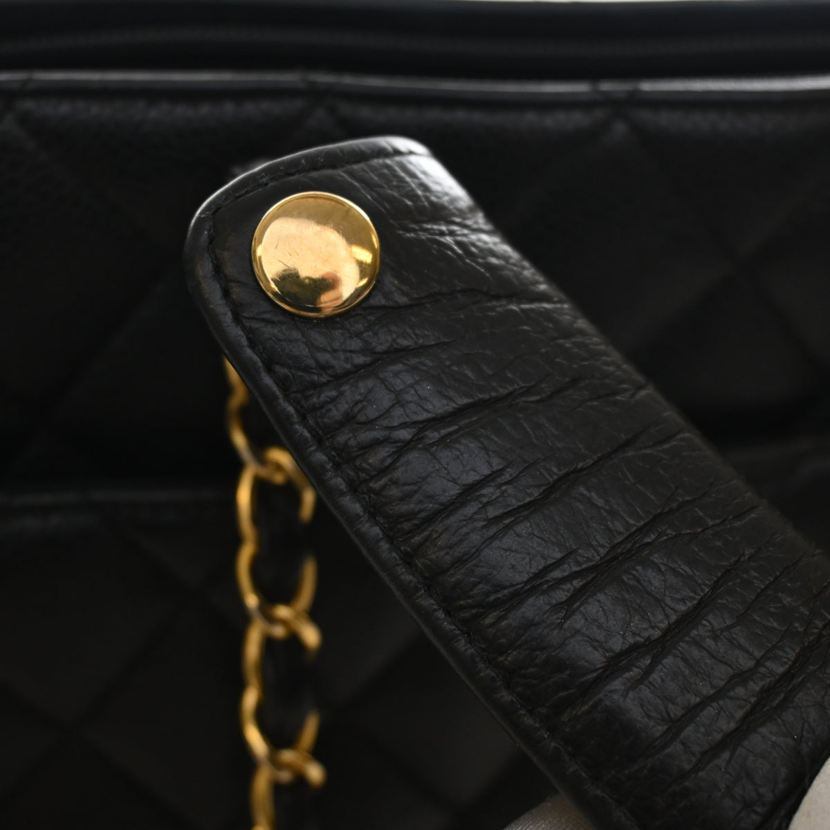 Vintage Chanel Shopping Tote Caviar Leather, gold hardware close-up