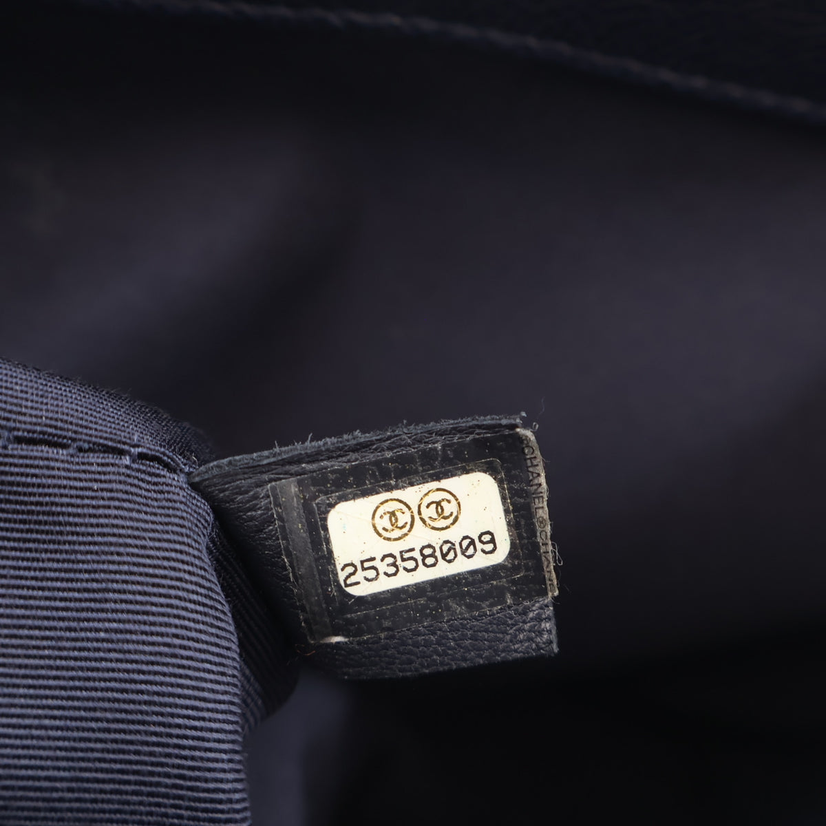 Pre-Owned Chanel Flap Bag Medium Caviar Leather Urban Companion, interior label and date code
