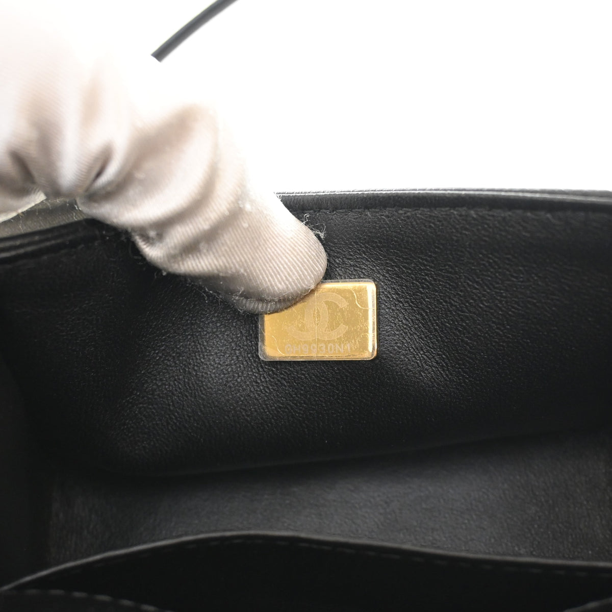 Pre-Owned Chanel Boy Bag Mini Caviar Leather, gold embossed logo detail