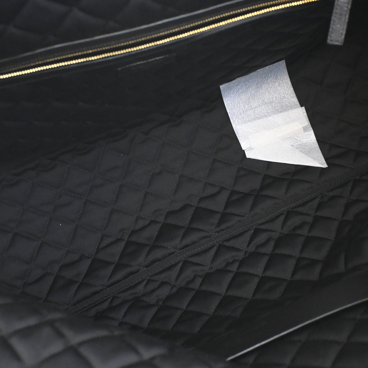 Pre-Owned Saint Laurent Calfskin ES Giant Travel Bag, open interior with lining