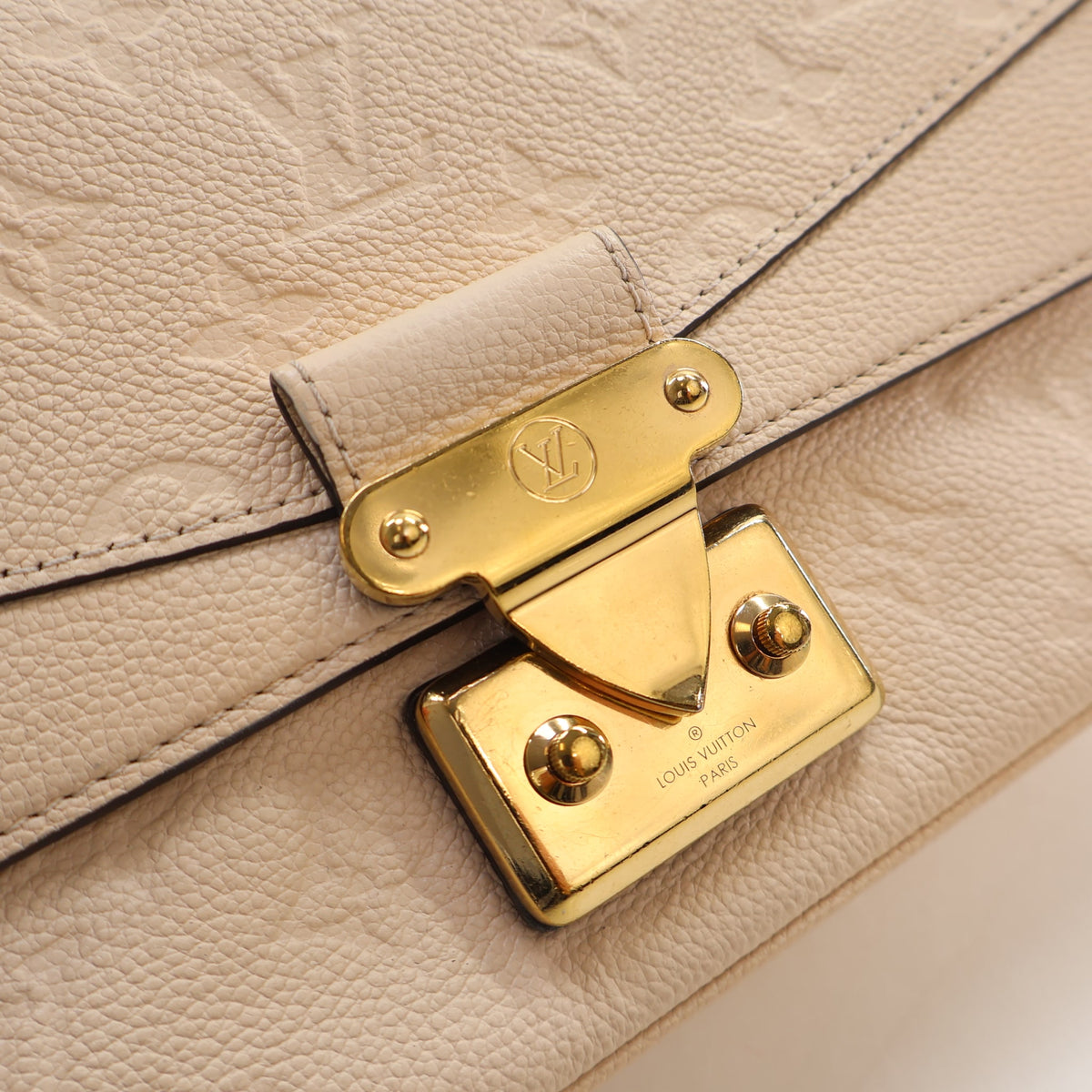 Pre-Owned Louis Vuitton Monogram Empreinte Marceau, gold hardware close-up