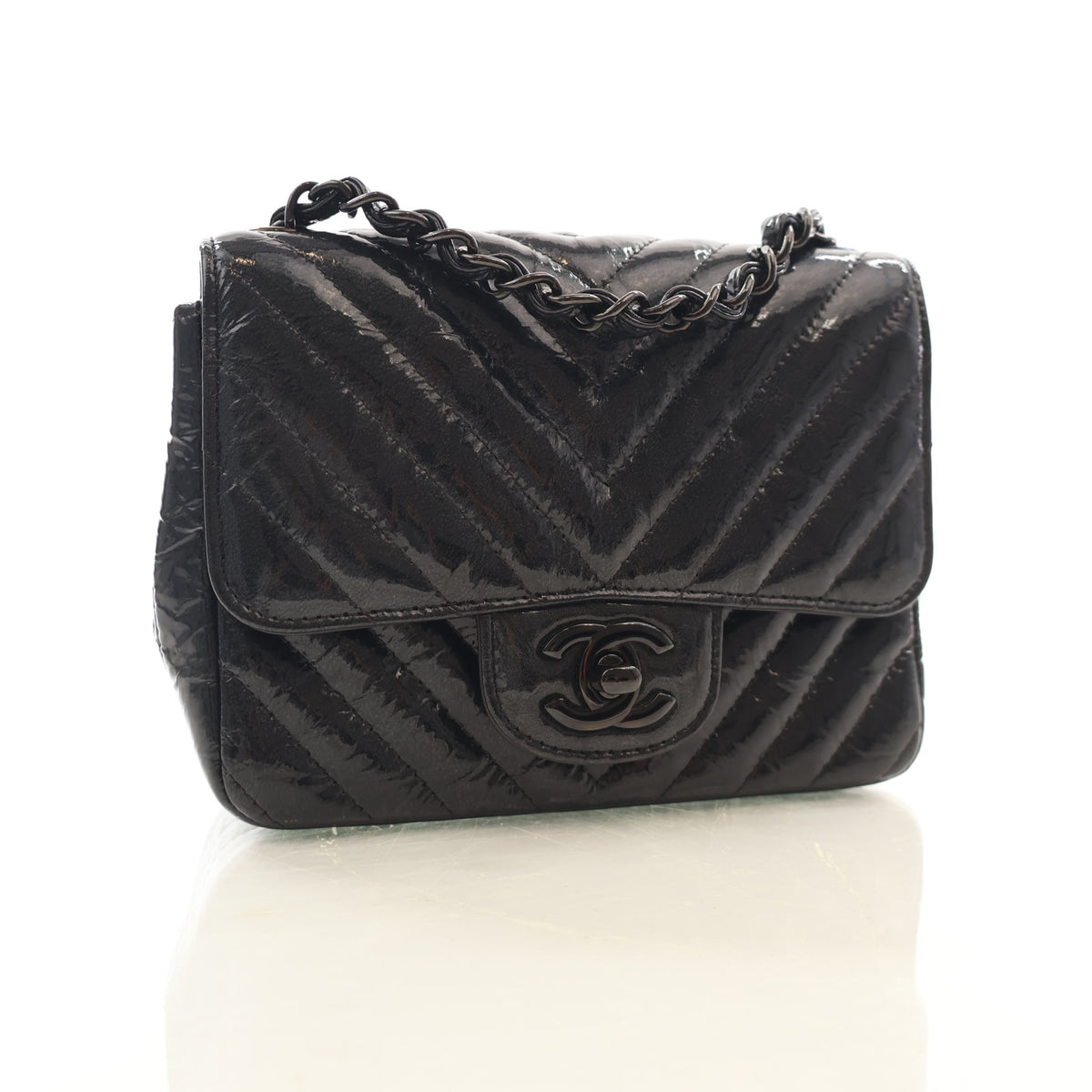 Pre-Owned Chanel Flap Bag Mini Patent Leather Single, three-quarter view, authenticated at Luxe Du Jour