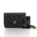 Chanel Mini Lambskin Wallet...