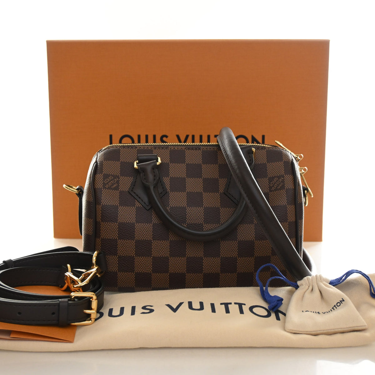 Pre-Owned Louis Vuitton Speedy Bandouliere 20 Damier Ebene, shown with dust bag and packaging