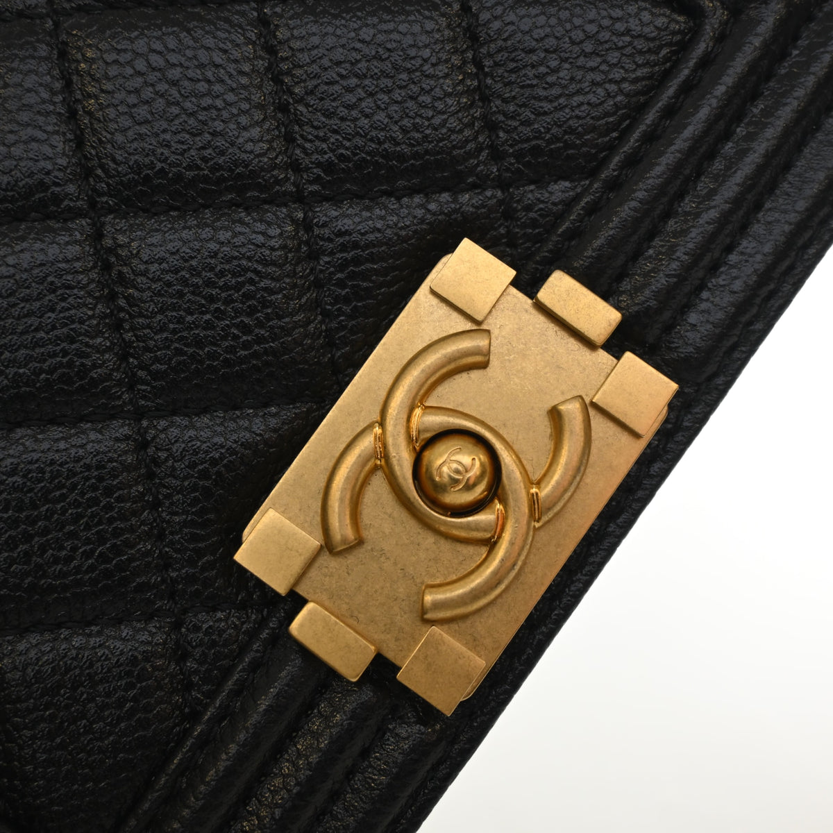 Pre-Owned Chanel Boy Bag Mini Caviar Leather, gold hardware close-up