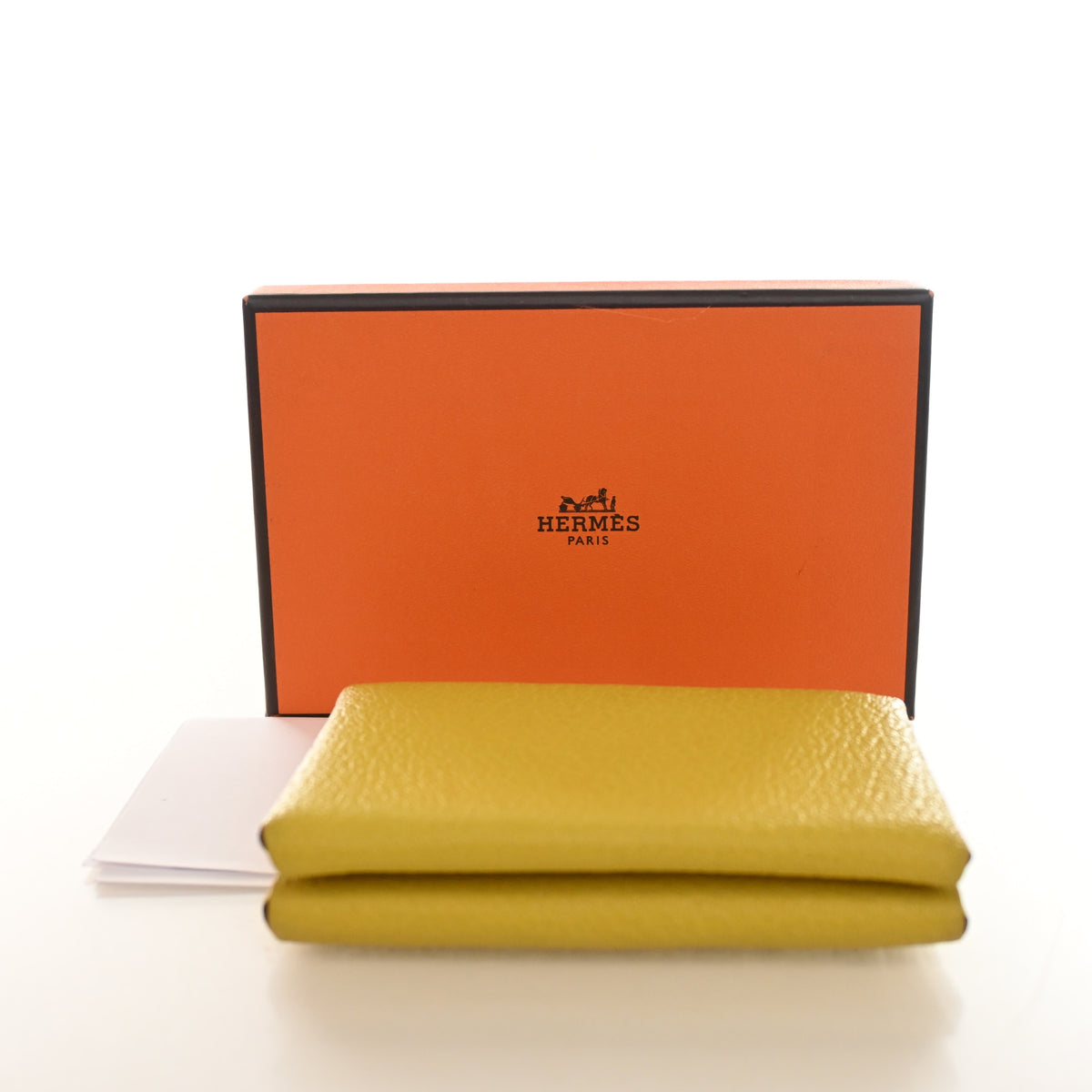 Pre-Owned Hermès Card Holder Jaune De Naples Calvi Duo, shown with dust bag and packaging