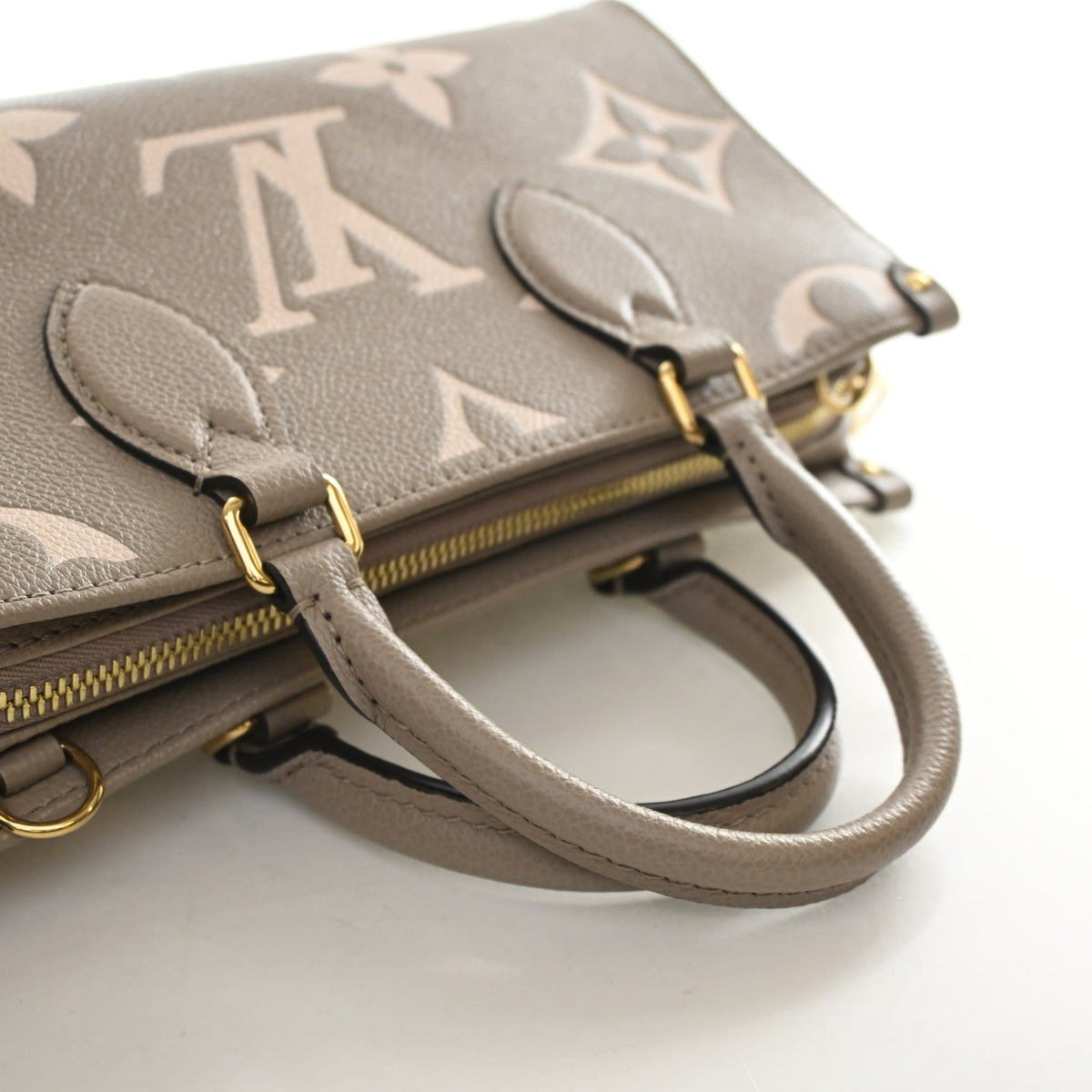 Louis Vuitton Monogram Empreinte Giant OnTheGo East-West, photo 9 of 13