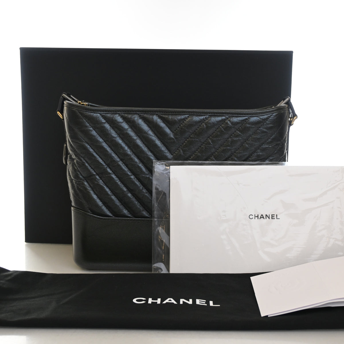 Pre-Owned Chanel Hobo Medium Aged Calfskin Gabrielle, shown with dust bag and packaging