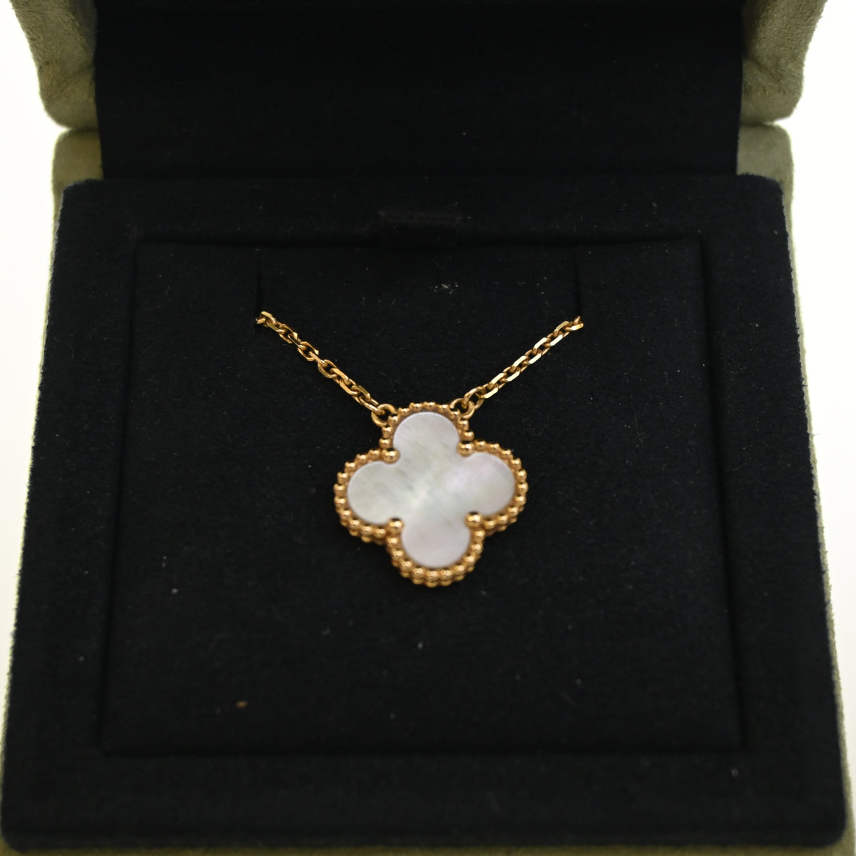 Vintage Van Cleef & Arpels Alhambra Mother Of Pearl Pendant, shown with dust bag and packaging