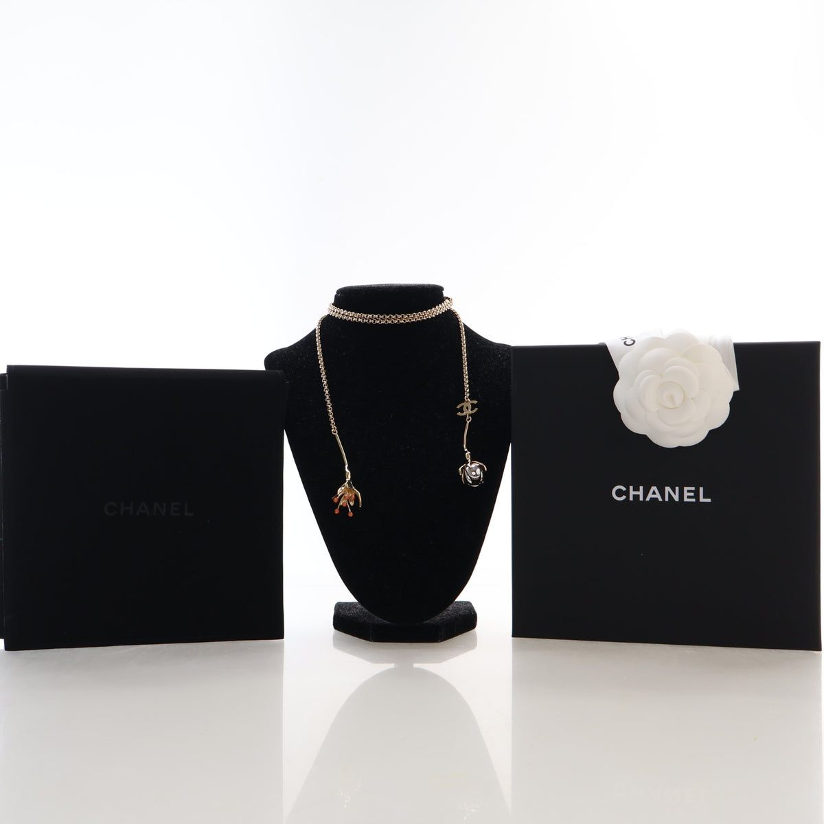Pre-Owned Chanel Necklace Resin CC Long, shown with dust bag and packaging