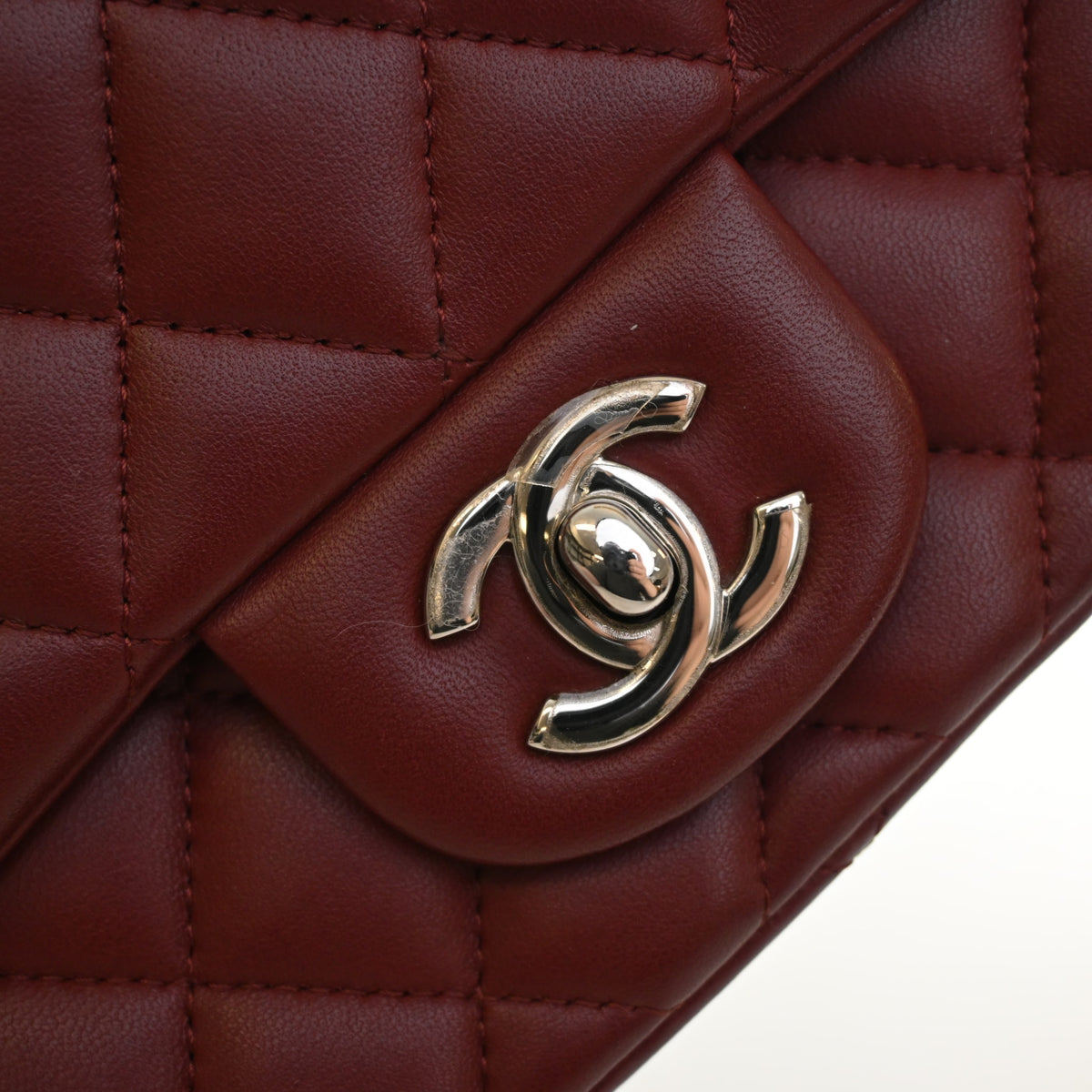 Pre-Owned Chanel Classic Flap Mini Lambskin Square Bag, silver embossed logo detail