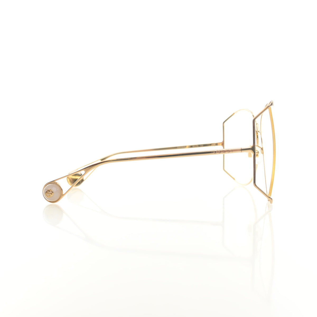 Pre-Owned Gucci Sunglasses Oversizes Metal, side profile, authenticated at Luxe Du Jour