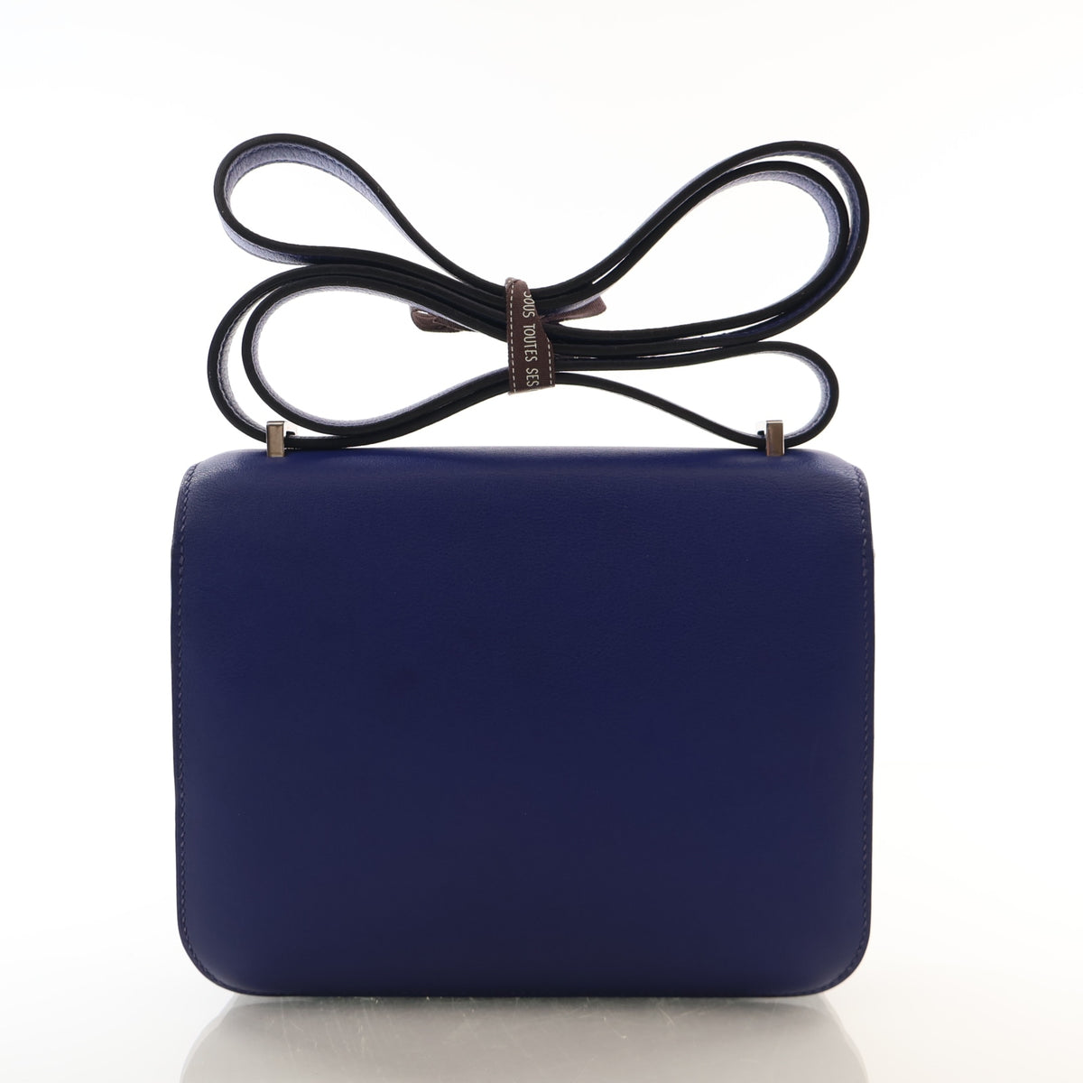 Pre-Owned Hermès Constance 18 Bleu Saphir Swift Leather, flat lay