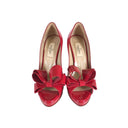 Product - Valentino Bow Pat...