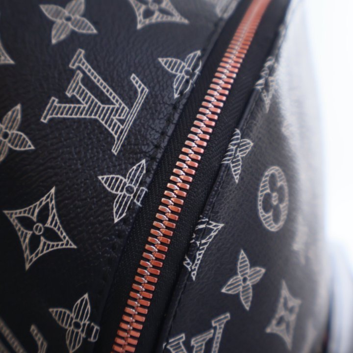 Pre-Owned Louis Vuitton Backpack Monogram Ink Upside Down Apollo, gold hardware close-up