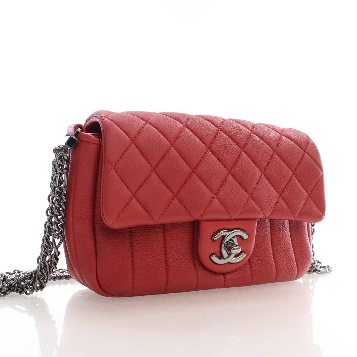 Pre-Owned Chanel Flap Bag Mini Lambskin Classic Single, three-quarter view, authenticated at Luxe Du Jour