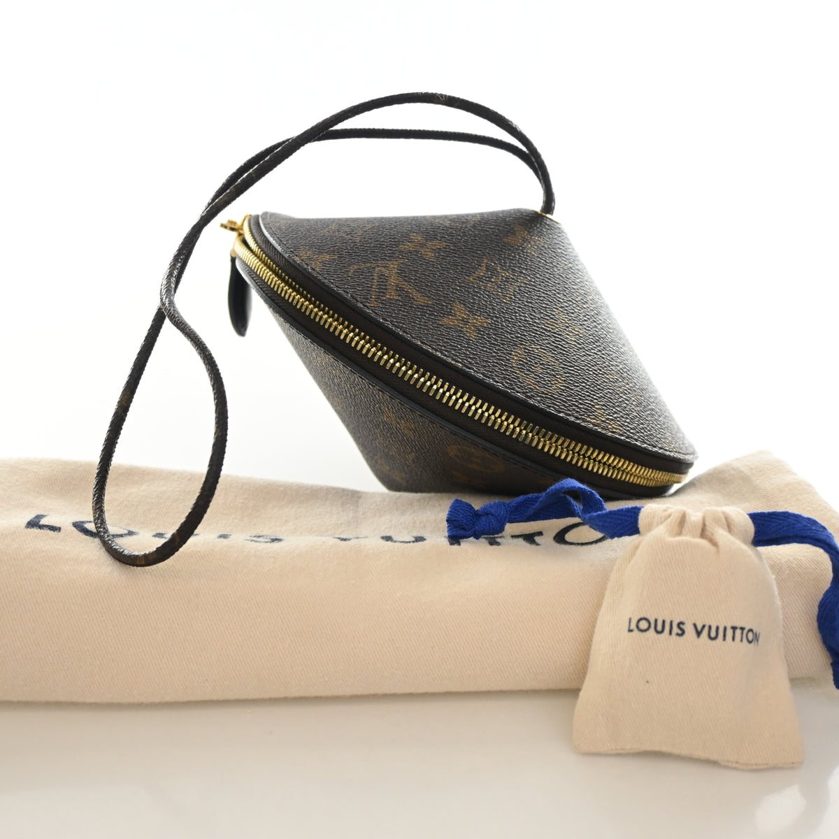 Pre-Owned Louis Vuitton Monogram Toupie, shown with dust bag and packaging