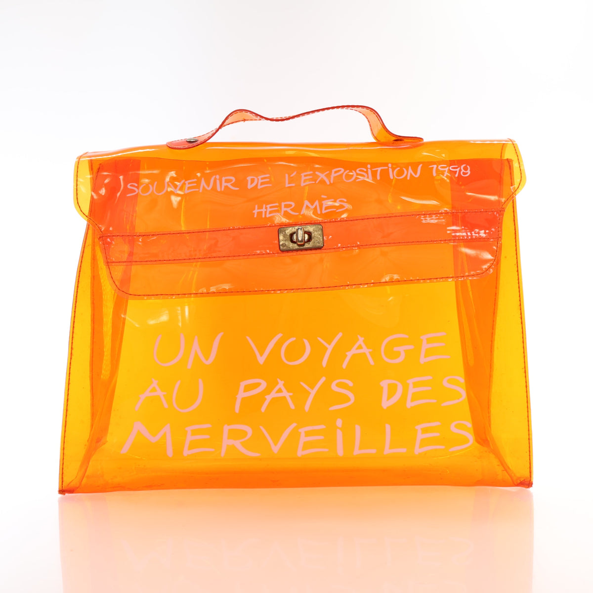 Vintage Hermès Orange Vinyl Souvenir De L’exposition, front view, authenticated at Luxe Du Jour