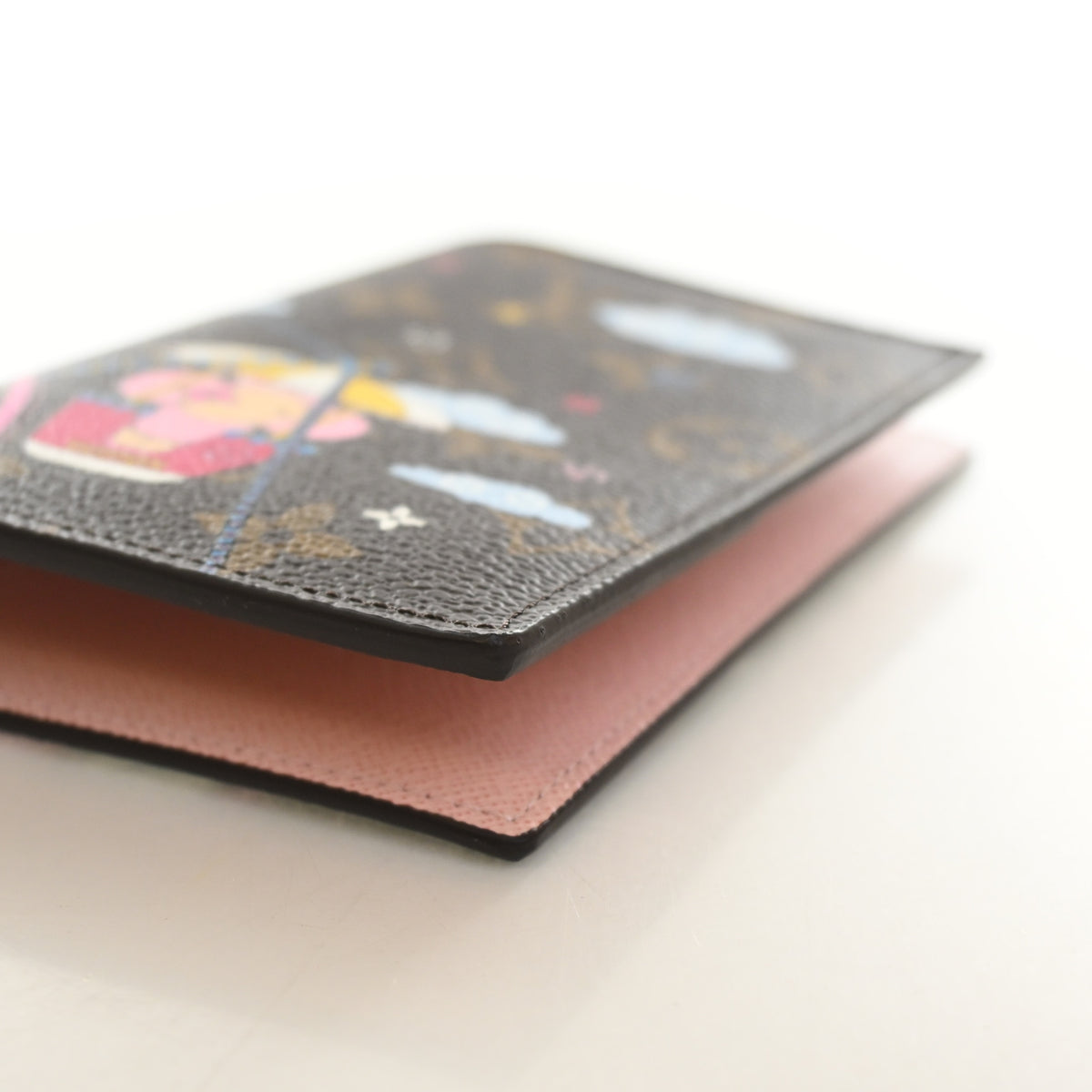 Pre-Owned Louis Vuitton Monogram Holiday Animation Passport Holder, side profile, photo 8 of 12