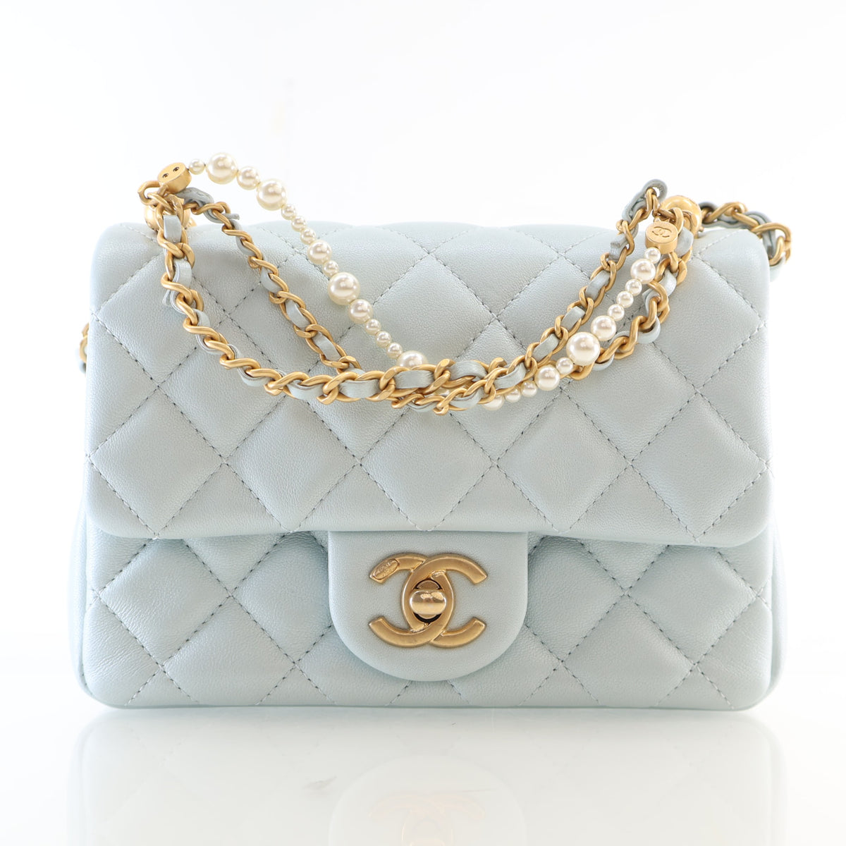 Pre-Owned Chanel Flap Bag Mini Lambskin Pearl Twist Square, front view, authenticated at Luxe Du Jour