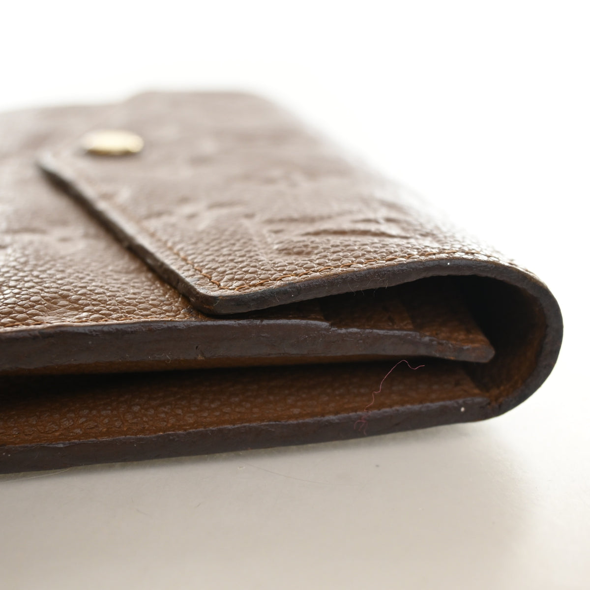 Pre-Owned Louis Vuitton Wallet Monogram Empreinte Curieuse, side profile, photo 13 of 19