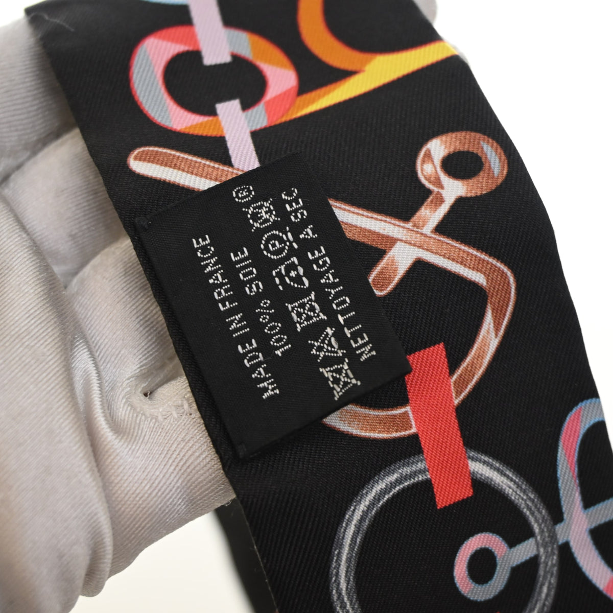 Pre-Owned Hermès Do Re Boucles Silk Twilly, interior label and date code, authenticated at Luxe Du Jour