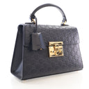 Gucci Small Guccissima Padl...
