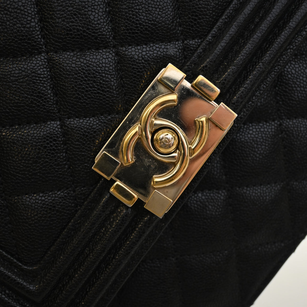 Pre-Owned Chanel Boy Bag Caviar Leather North South, gold hardware close-up