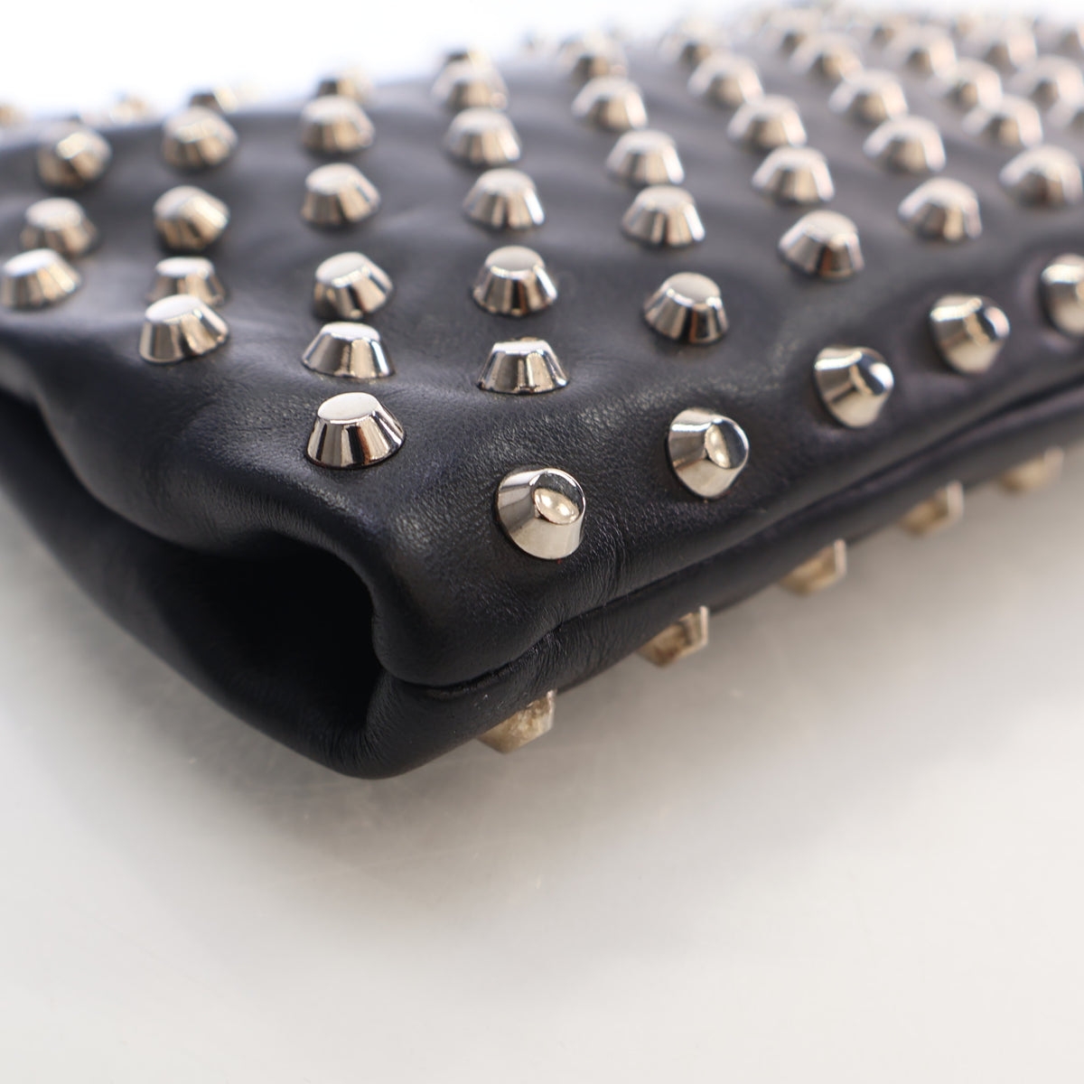 Pre-Owned Prada Clutch Calf Metal Studded Leather, corner and edge detail