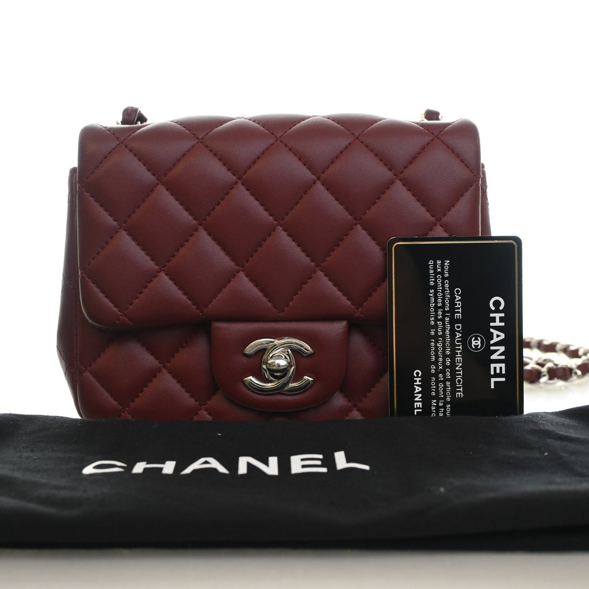 Pre-Owned Chanel Classic Flap Mini Lambskin Square Bag, shown with dust bag and packaging