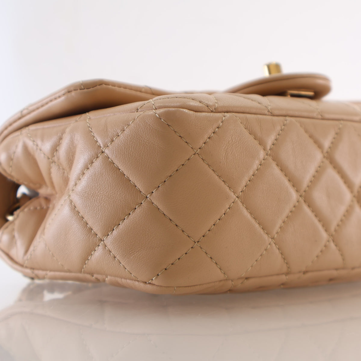 Pre-Owned Chanel Flap Bag Mini Lambskin Pearl Crush, base and feet view, photo 7 of 21