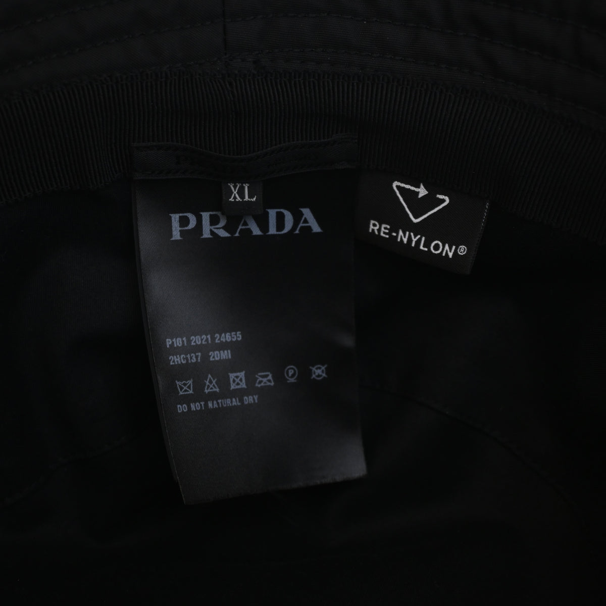 Pre-Owned Prada Hat Re-nylon Logo Bucket, interior label and date code