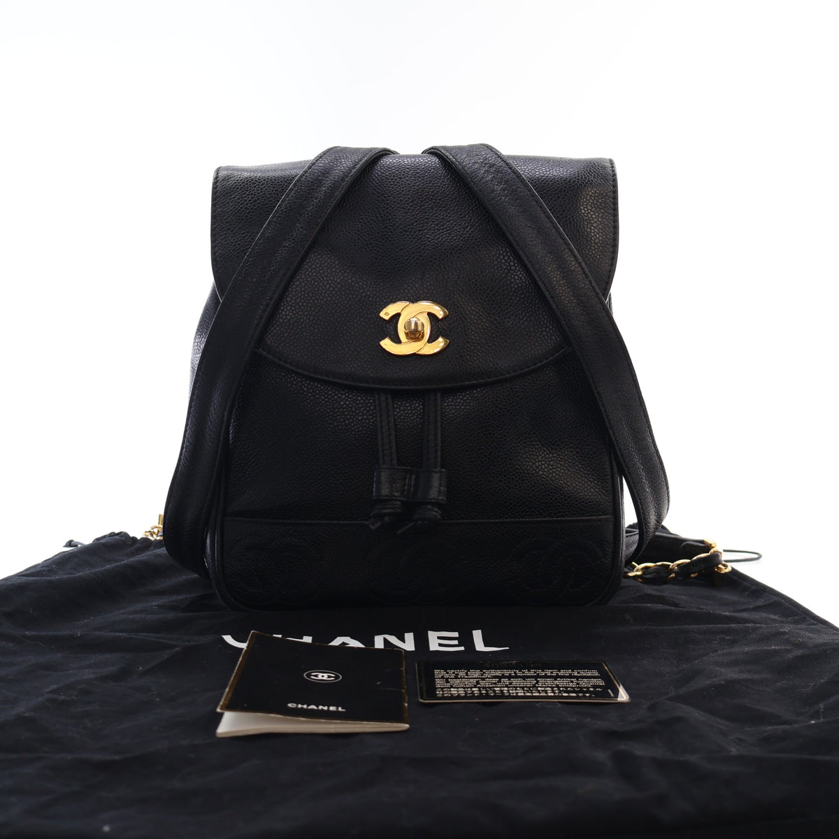 Vintage Chanel Backpack Caviar Leather Triple CC, shown with dust bag and packaging