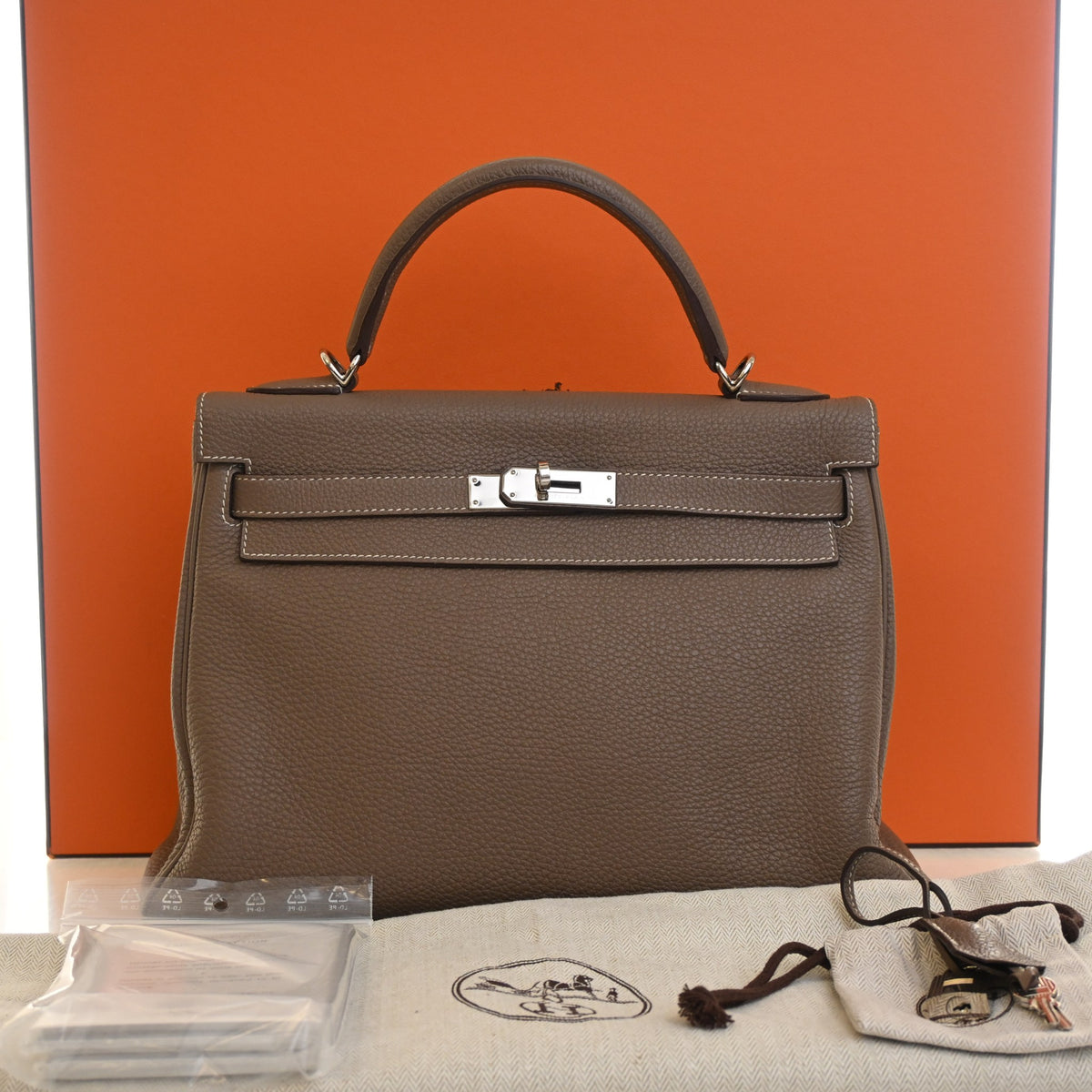 Pre-Owned Hermès Kelly 32 Etoupe Togo Leather, with dust bag