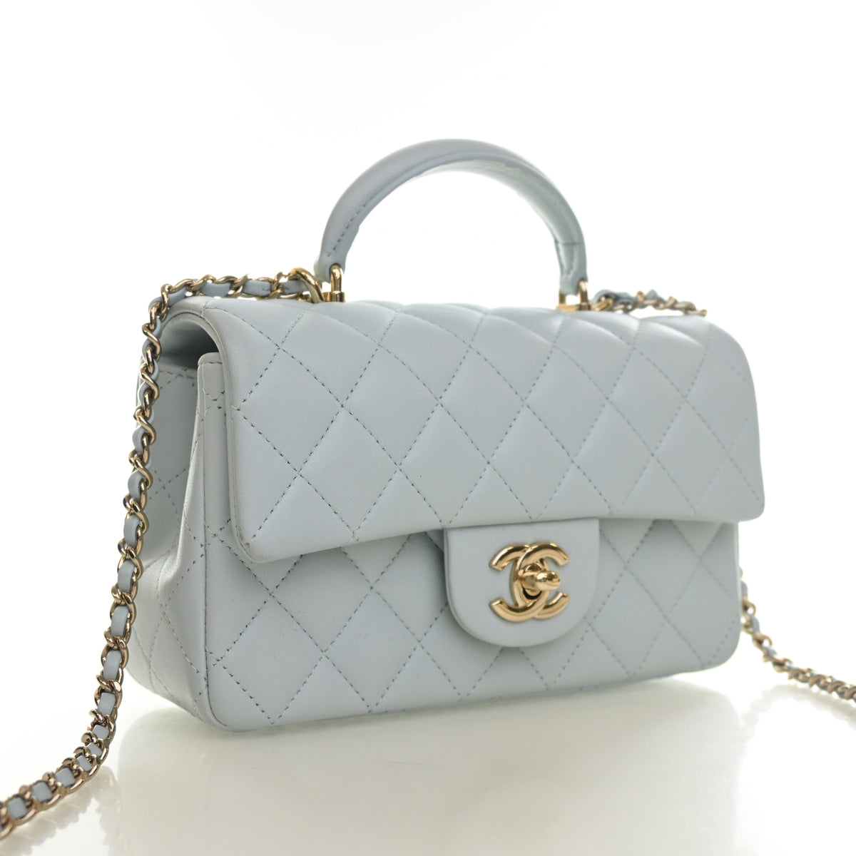 Pre-Owned Chanel Classic Flap Mini Lambskin Rectangular Top Handle Bag, three-quarter view, authenticated at Luxe Du Jour