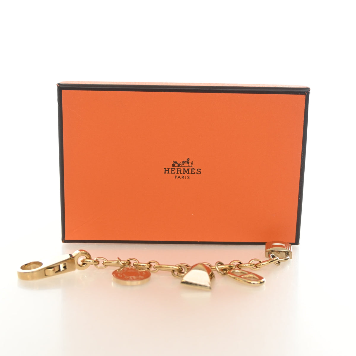 Pre-Owned Hermès Charm Breloque Olga Bag, shown with dust bag and packaging