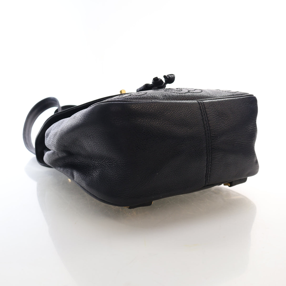 Vintage Chanel Backpack Caviar Leather Triple CC, base and feet view