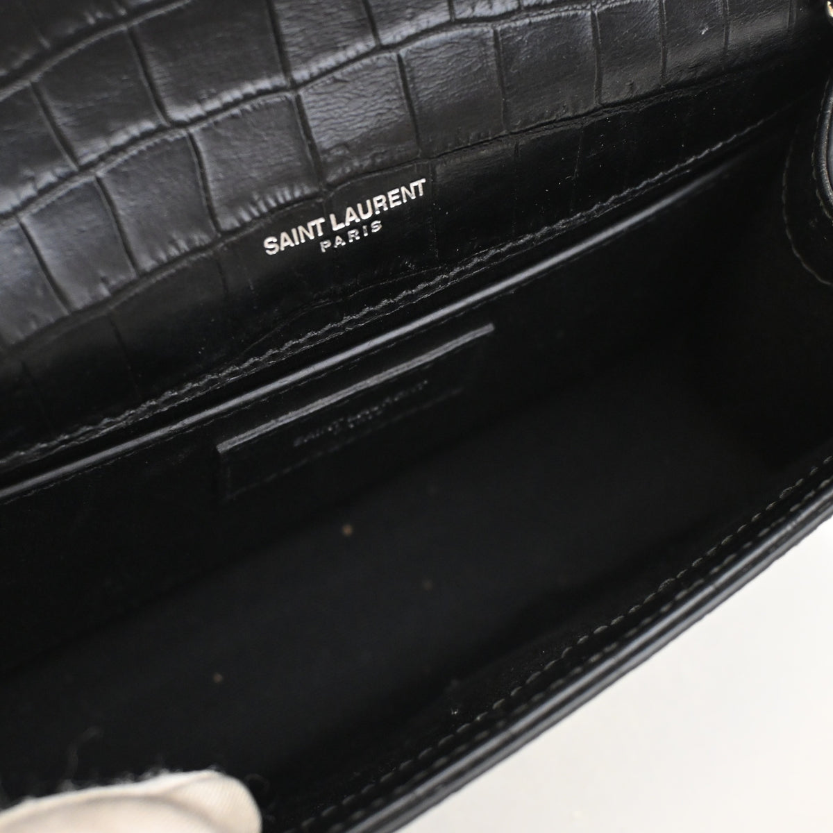 Pre-Owned Saint Laurent Small Crocodile Leather Embossed Leather Kate Tassle Bag, open interior with lining