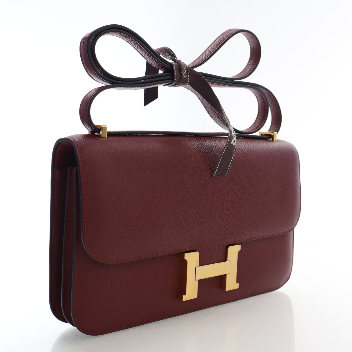 Pre-Owned Hermès Constance 25 Rouge H Epsom Leather Elan, three-quarter view, authenticated at Luxe Du Jour