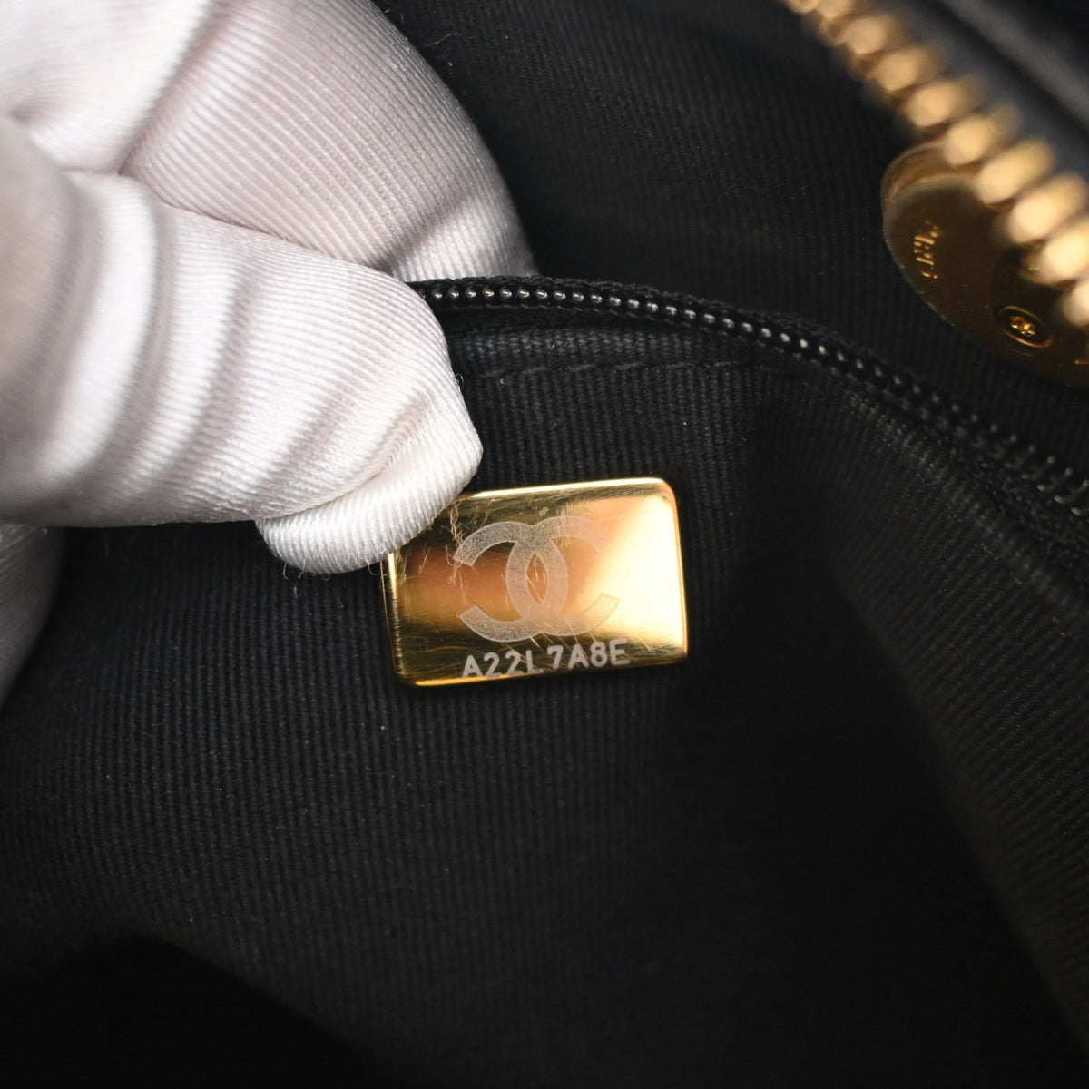 Pre-Owned Chanel Small Caviar Leather Bowling Bag, gold hardware close-up