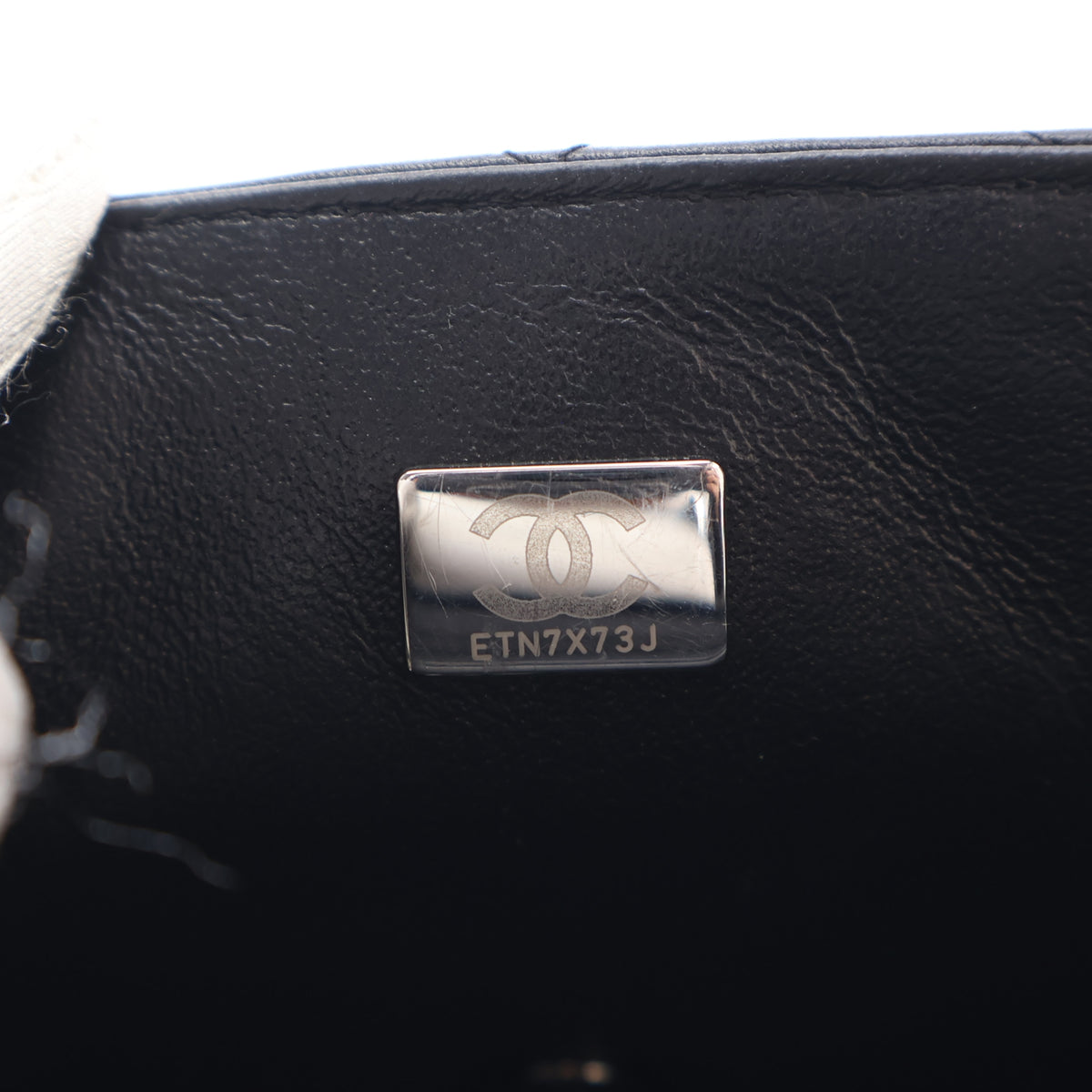 Pre-Owned Chanel Flap Bag Mini Lambskin So Black Square, silver embossed logo detail