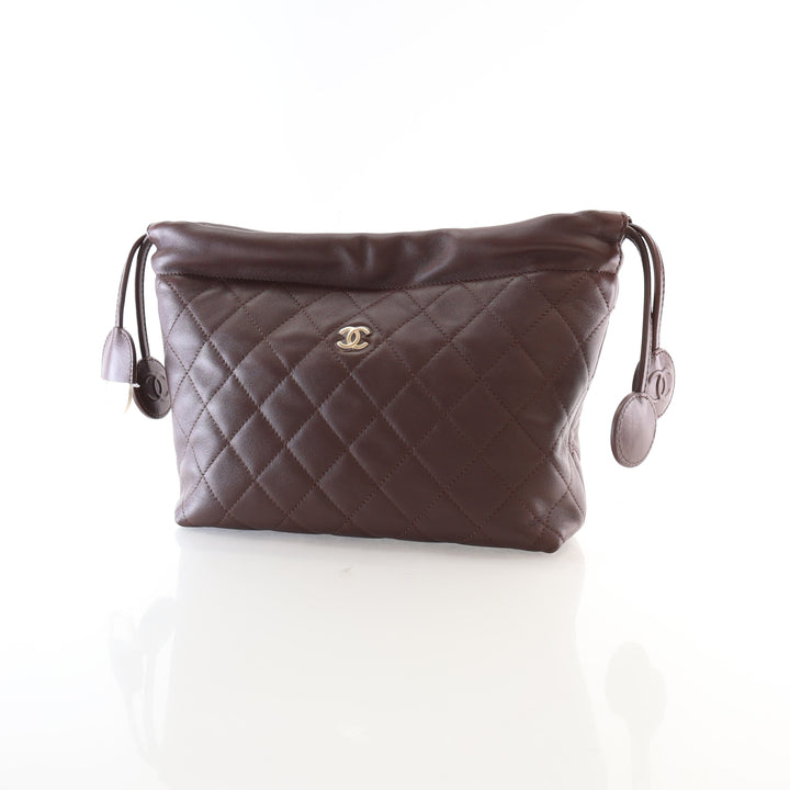 Chanel Lambskin Drawstring Clutch With Strap