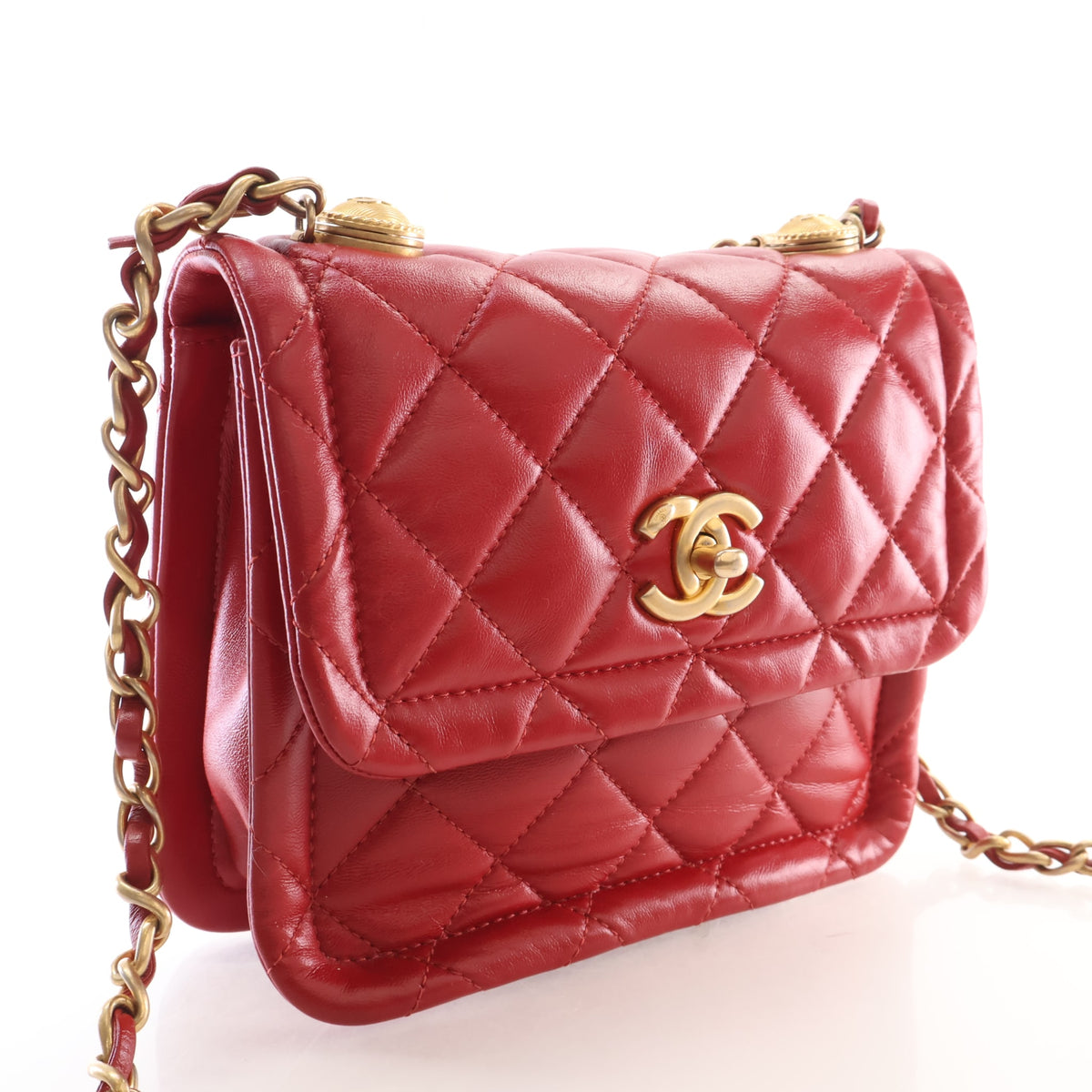 Pre-Owned Chanel Flap Bag Small Lambskin CC Twist Your Buttons, three-quarter view, authenticated at Luxe Du Jour