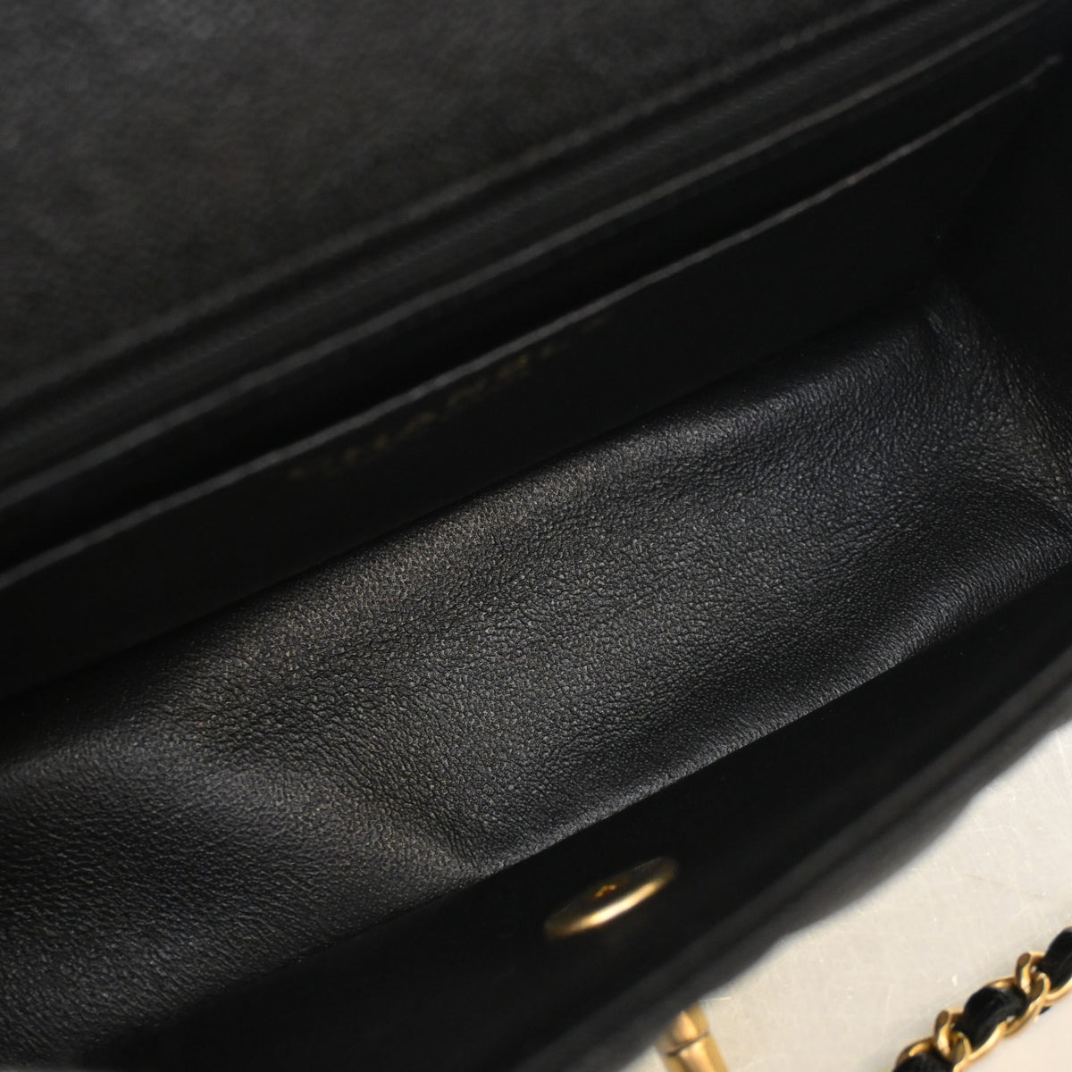 Pre-Owned Chanel Classic Flap Mini Caviar Leather Rectangular Top Handle Bag, open interior with lining