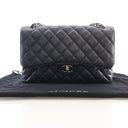 Chanel Jumbo Caviar CC Flap...