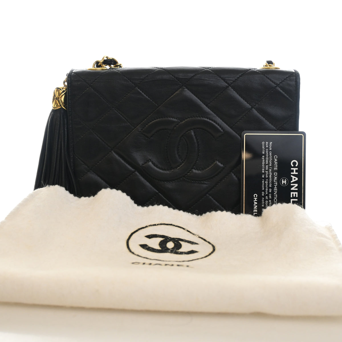 Vintage Chanel Flap Bag Lambskin CC Tassel, shown with dust bag and packaging
