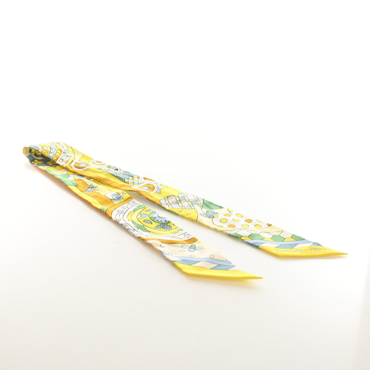 Pre-Owned Hermès Les Murmures De La Foret Silk Twilly, flat lay, authenticated at Luxe Du Jour